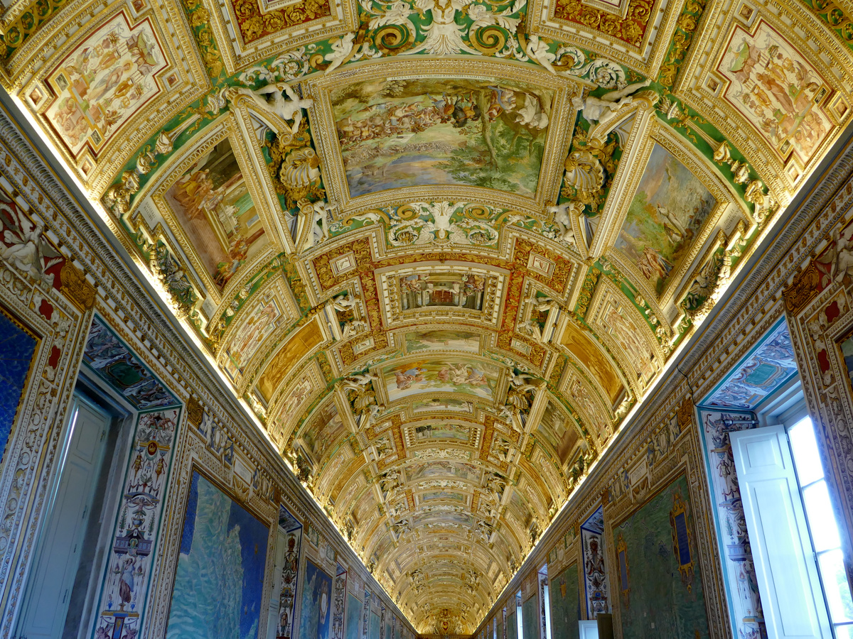 gloriously colourful and incredibly long ceiling of many paintings