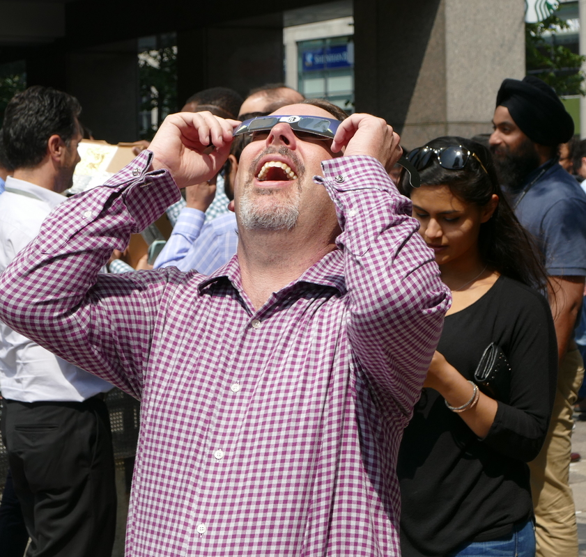 Man watching the eclipse.