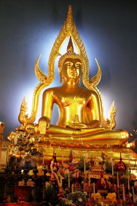 glowing golden Buddha image